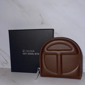 Brown  Telfar wallet in new condition. Comes with box.